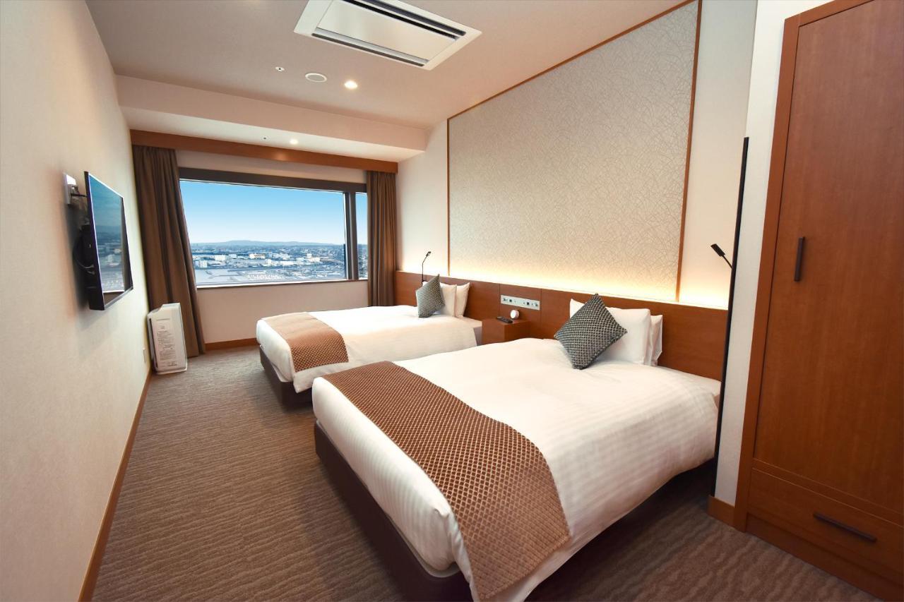 Odysis Suites Osaka Airport Hotel Идзумисано Экстерьер фото