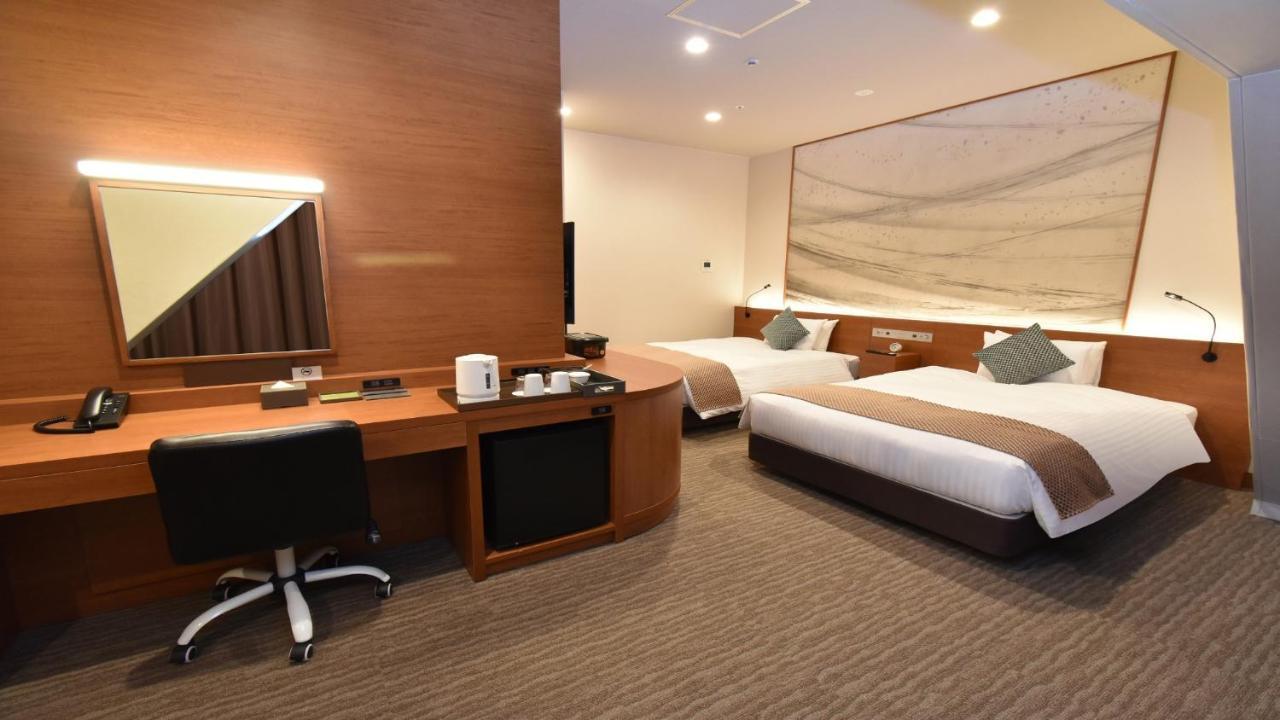 Odysis Suites Osaka Airport Hotel Идзумисано Экстерьер фото
