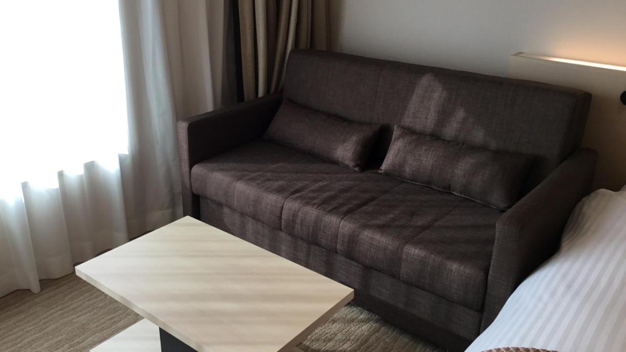 Odysis Suites Osaka Airport Hotel Идзумисано Экстерьер фото