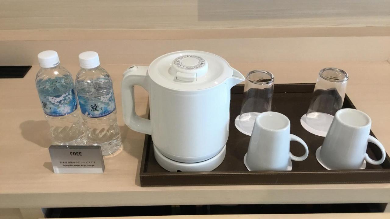 Odysis Suites Osaka Airport Hotel Идзумисано Экстерьер фото