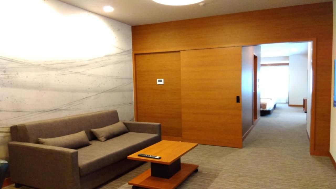 Odysis Suites Osaka Airport Hotel Идзумисано Экстерьер фото