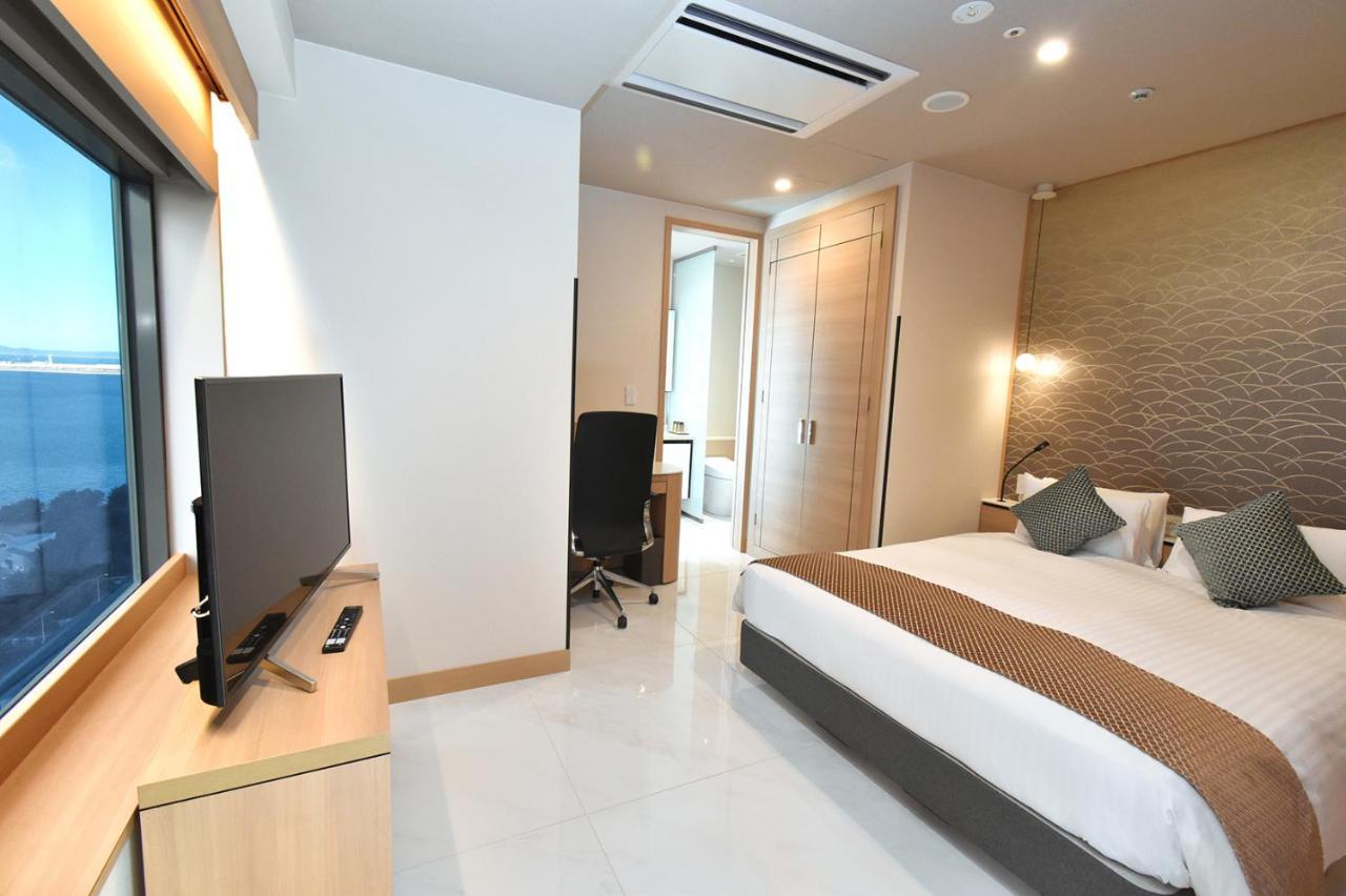 Odysis Suites Osaka Airport Hotel Идзумисано Экстерьер фото