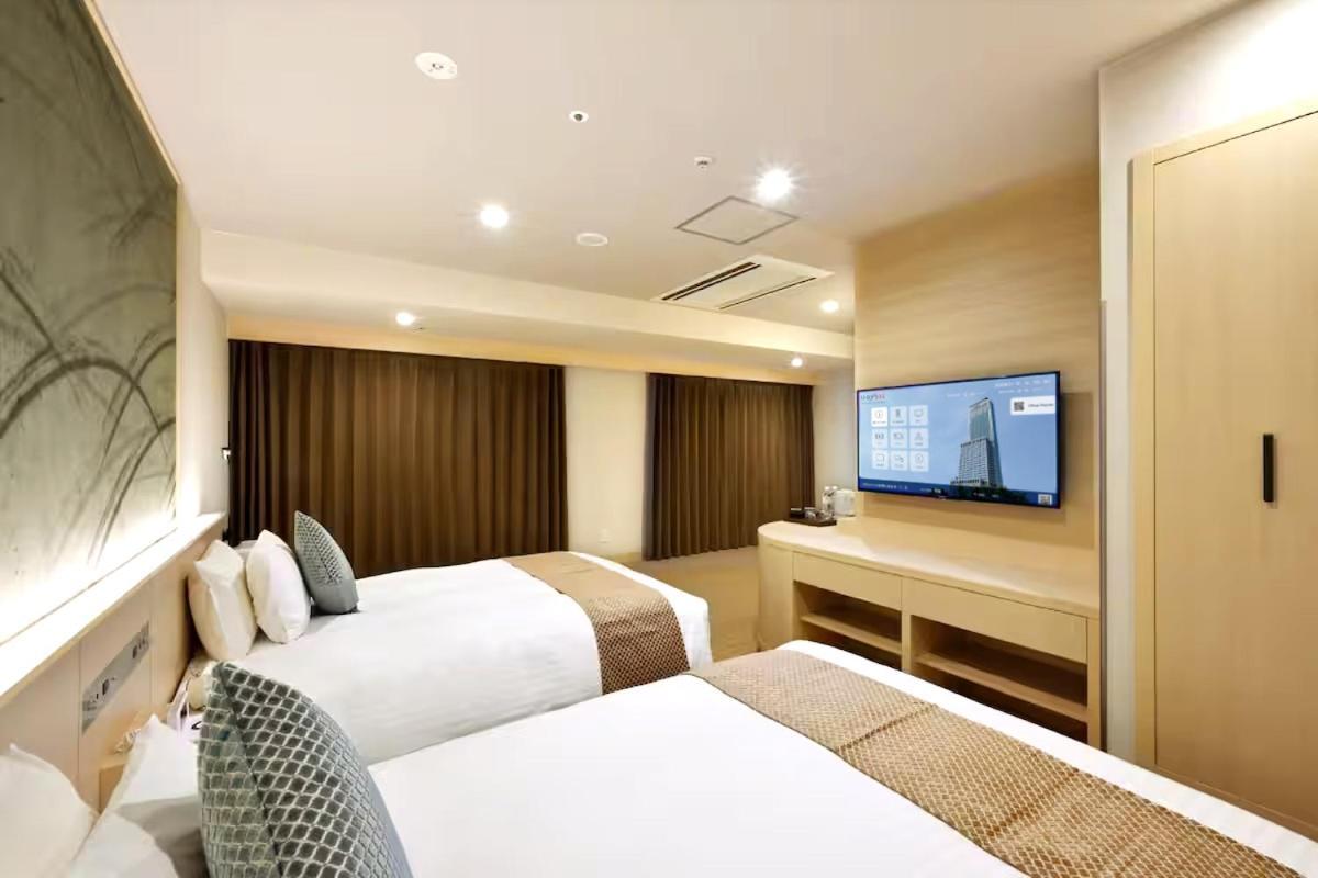 Odysis Suites Osaka Airport Hotel Идзумисано Экстерьер фото