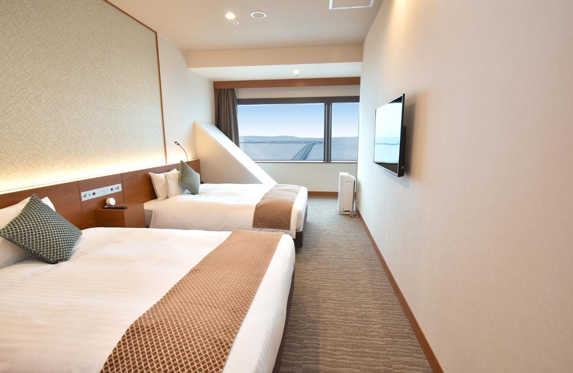 Odysis Suites Osaka Airport Hotel Идзумисано Экстерьер фото